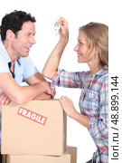 Couple moving into their new home. Стоковое фото, агентство Ingram Publishing / Фотобанк Лори