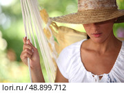 Woman in a hammock. Стоковое фото, агентство Ingram Publishing / Фотобанк Лори