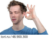 student making an okay sign. Стоковое фото, агентство Ingram Publishing / Фотобанк Лори