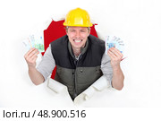 craftsman rejoicing over purchase power. Стоковое фото, агентство Ingram Publishing / Фотобанк Лори