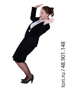 Businesswoman struggling to keep balance. Стоковое фото, агентство Ingram Publishing / Фотобанк Лори
