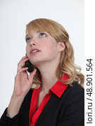 Blond office becoming stressed during telephone call. Стоковое фото, агентство Ingram Publishing / Фотобанк Лори