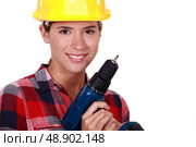 woman with drill. Стоковое фото, агентство Ingram Publishing / Фотобанк Лори