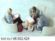 Teenagers revising. Стоковое фото, агентство Ingram Publishing / Фотобанк Лори