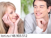 Couple flirting at home. Стоковое фото, агентство Ingram Publishing / Фотобанк Лори