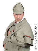 Man dressed like Sherlock Holmes and looking at us. Стоковое фото, агентство Ingram Publishing / Фотобанк Лори