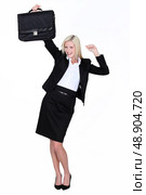 Excited businesswoman with a briefcase. Стоковое фото, агентство Ingram Publishing / Фотобанк Лори
