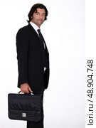 Businessman carrying a briefcase. Стоковое фото, агентство Ingram Publishing / Фотобанк Лори