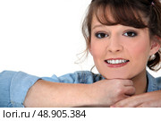 Portrait of a half-smiling woman. Стоковое фото, агентство Ingram Publishing / Фотобанк Лори