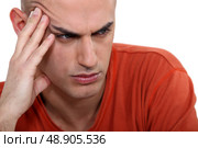 Stressed young man. Стоковое фото, агентство Ingram Publishing / Фотобанк Лори