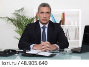 An austere businessman. Стоковое фото, агентство Ingram Publishing / Фотобанк Лори