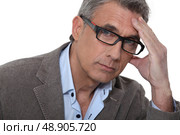Man with headache. Стоковое фото, агентство Ingram Publishing / Фотобанк Лори