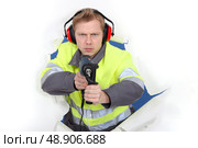 Man in reflective jacket. Стоковое фото, агентство Ingram Publishing / Фотобанк Лори