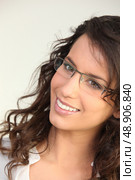 Brunette wearing glasses. Стоковое фото, агентство Ingram Publishing / Фотобанк Лори