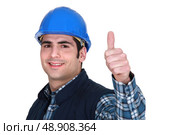 Worker giving the thumbs up. Стоковое фото, агентство Ingram Publishing / Фотобанк Лори