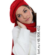 Woman in a knitted jumper, scarf and hat. Стоковое фото, агентство Ingram Publishing / Фотобанк Лори