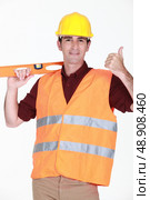 Tradesman giving the thumb’s up. Стоковое фото, агентство Ingram Publishing / Фотобанк Лори
