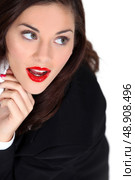 Woman wearing red lipstick. Стоковое фото, агентство Ingram Publishing / Фотобанк Лори