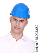 portrait of straight-faced craftsman. Стоковое фото, агентство Ingram Publishing / Фотобанк Лори
