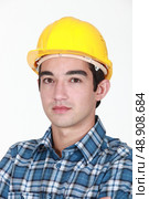 Young male builder. Стоковое фото, агентство Ingram Publishing / Фотобанк Лори