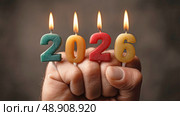 Свечи в форме цифры 2026 на пальцах. Разноцветные горящие свечи, образующие цифру 2026, каждая из которых удерживается вертикально сжатым кулаком, символизируют силу и праздник. Стоковое AI-изображение, AI-художник Анна Чижова / Фотобанк Лори