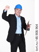 Businessman raising his fist. Стоковое фото, агентство Ingram Publishing / Фотобанк Лори