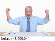exited businessman raising his hands. Стоковое фото, агентство Ingram Publishing / Фотобанк Лори