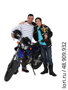 Father and son with motorcycle and trophy. Стоковое фото, агентство Ingram Publishing / Фотобанк Лори