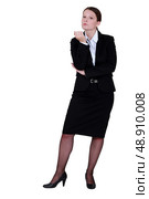 Businesswoman inspecting her nails. Стоковое фото, агентство Ingram Publishing / Фотобанк Лори