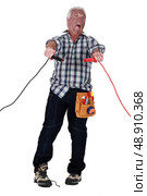 Man getting an electric shock. Стоковое фото, агентство Ingram Publishing / Фотобанк Лори