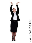Businesswoman reaching up. Стоковое фото, агентство Ingram Publishing / Фотобанк Лори