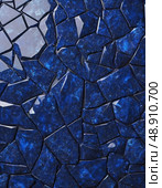 Unique sapphire mineral stone texture reveals a captivating collage of blue tones and jagged shapes, showcasing natures artistry in its raw form. Each fragment tells its own story Generative AI. Стоковое AI-изображение, AI-художник Юлия Петровская / Фотобанк Лори