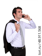 Businessman talking on his mobile. Стоковое фото, агентство Ingram Publishing / Фотобанк Лори