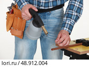 Tradesman using a blowtorch. Стоковое фото, агентство Ingram Publishing / Фотобанк Лори