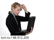 Woman caught in front of computer. Стоковое фото, агентство Ingram Publishing / Фотобанк Лори