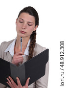 Close-up shot of a pensive businesswoman. Стоковое фото, агентство Ingram Publishing / Фотобанк Лори