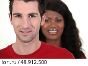 Head and shoulders of a happy couple shot in a studio. Стоковое фото, агентство Ingram Publishing / Фотобанк Лори