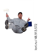 Painter falling backwards. Стоковое фото, агентство Ingram Publishing / Фотобанк Лори