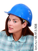 A sceptical tradeswoman. Стоковое фото, агентство Ingram Publishing / Фотобанк Лори