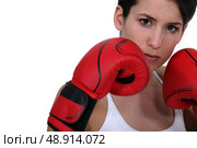 Woman wearing boxing gloves. Стоковое фото, агентство Ingram Publishing / Фотобанк Лори