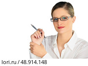 bespectacled blonde holding pen. Стоковое фото, агентство Ingram Publishing / Фотобанк Лори