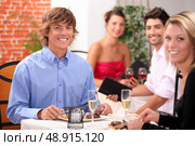 Couple having a meal together. Стоковое фото, агентство Ingram Publishing / Фотобанк Лори