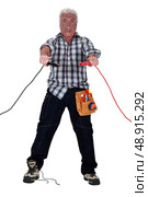 Technician being electrocuted. Стоковое фото, агентство Ingram Publishing / Фотобанк Лори