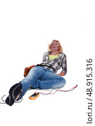 A shocked female electrician. Стоковое фото, агентство Ingram Publishing / Фотобанк Лори