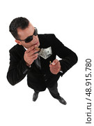 Questionable businessman. Стоковое фото, агентство Ingram Publishing / Фотобанк Лори