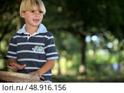 Little boy playing bongo s. Стоковое фото, агентство Ingram Publishing / Фотобанк Лори
