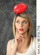 Woman with romance on her mind. Стоковое фото, агентство Ingram Publishing / Фотобанк Лори