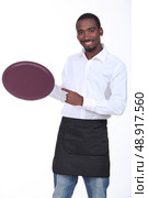 young black waiter. Стоковое фото, агентство Ingram Publishing / Фотобанк Лори