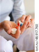 Woman with medication. Стоковое фото, агентство Ingram Publishing / Фотобанк Лори