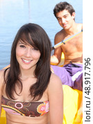 Couple in a canoe. Стоковое фото, агентство Ingram Publishing / Фотобанк Лори